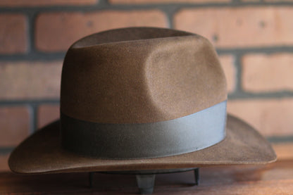 Handcrafted replica fedora modeled after the iconic hat worn by Harrison Ford as Indiana Jones.